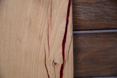 Red resin in the door frame of The Boardroom, Logie Timber's showroom at Logie Steading