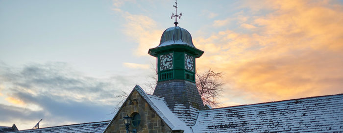 wintery clock tower at Logie Steading
